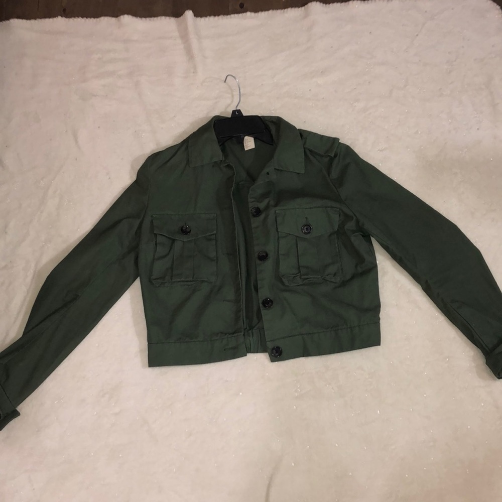 An olive green jean jacket.